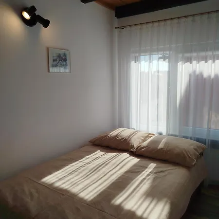 Quarto em Acomodações Particulares Hortensjowy Zakatek Goscinne