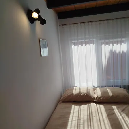 Quarto em Acomodações Particulares Hortensjowy Zakatek Goscinne *