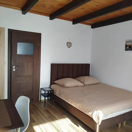 Quarto em Acomodações Particulares Hortensjowy Zakatek Goscinne *